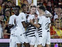 Rennes' Benjamin Bourigeaud celebrates scoring their first goal with teammates on August 20, 2023